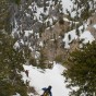 Derek drops though the sneak couloir
