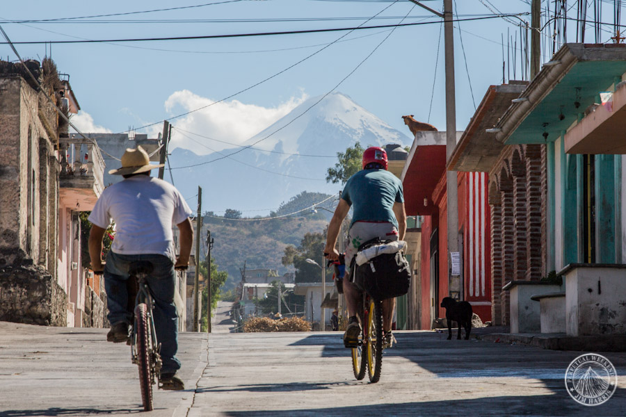 Mehk, a local, and the hounds all look towards Orizaba in Aljojuca